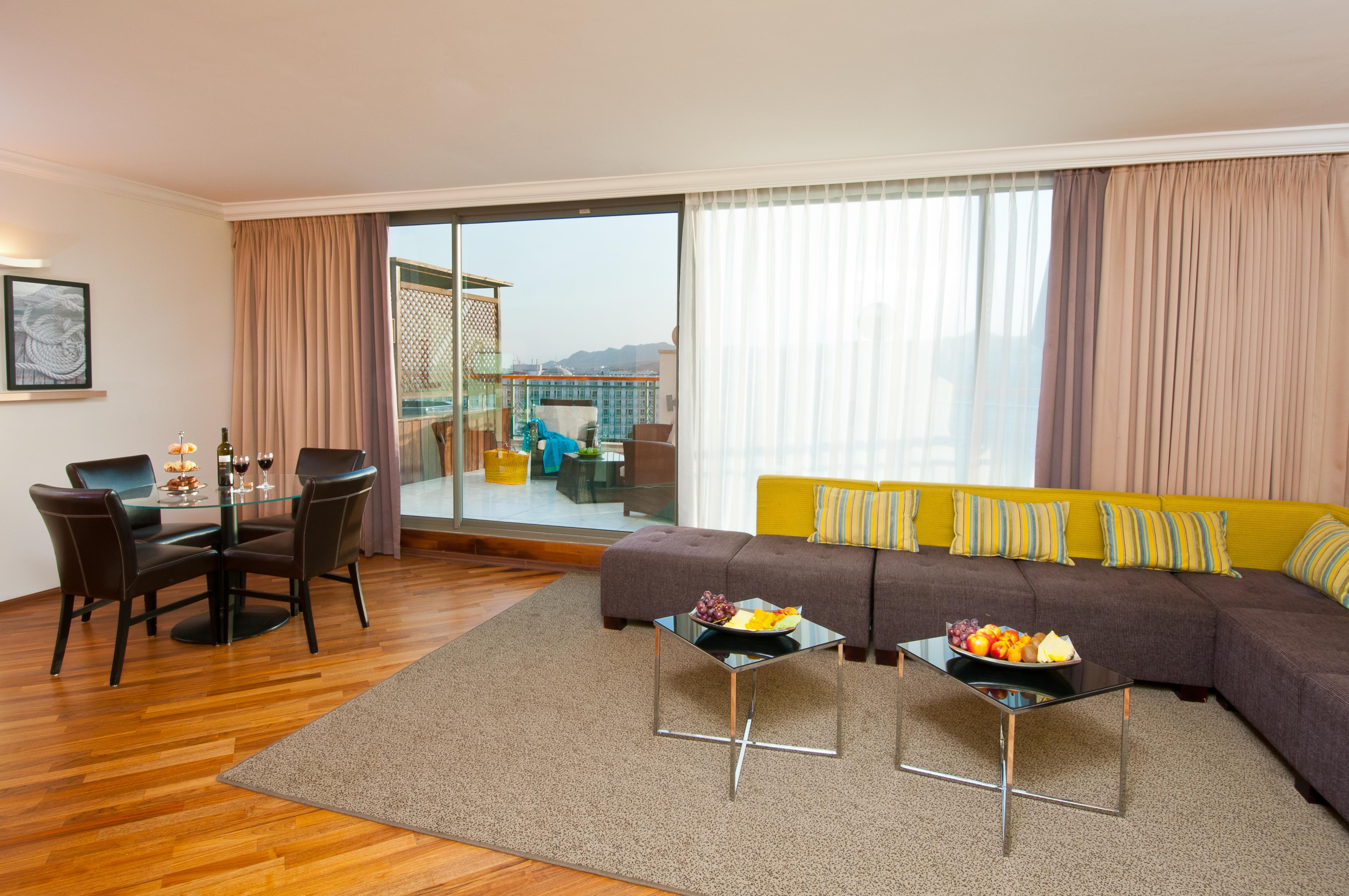 U Magic Palace Eilat Exteriör bild A living room at the hotel